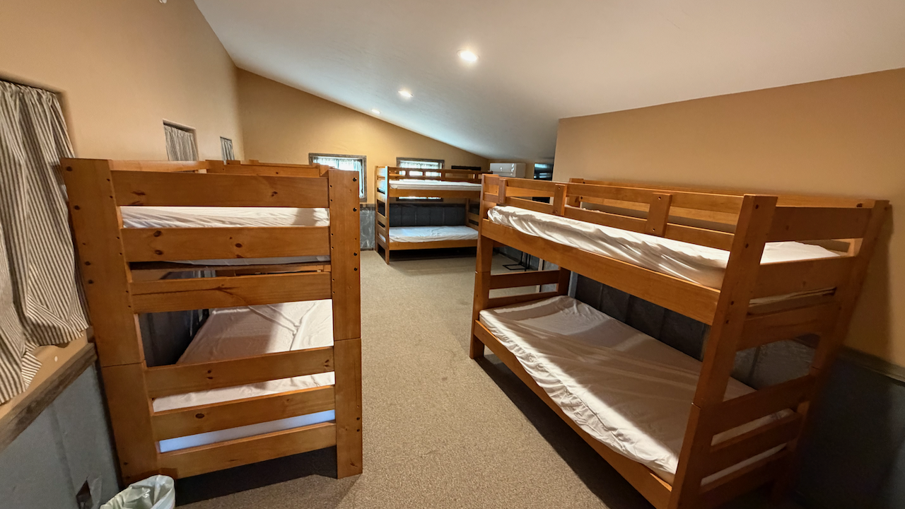 Sleeping area inside Old Barn Bunkhouse