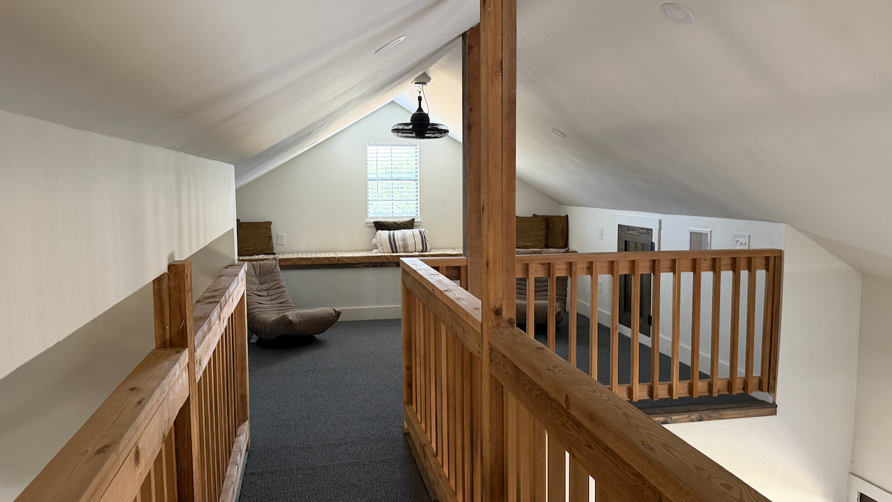 Loft sleeping area in three-bedroom house