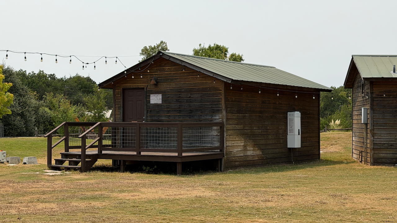 Bathroom and shower facilities serving the Captivating TX bunkhouses