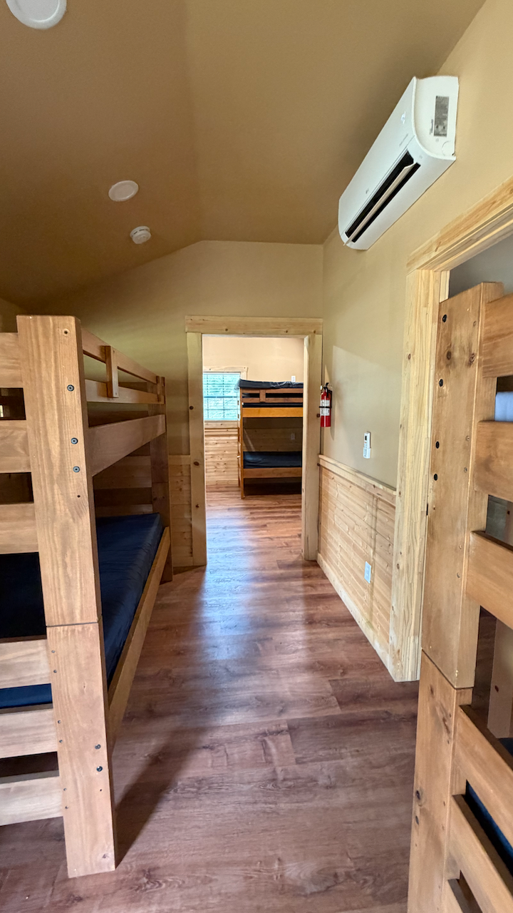 Interior of creekside bunkhouse cabin